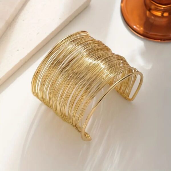 Women Gold plated Bangle style bracelette
